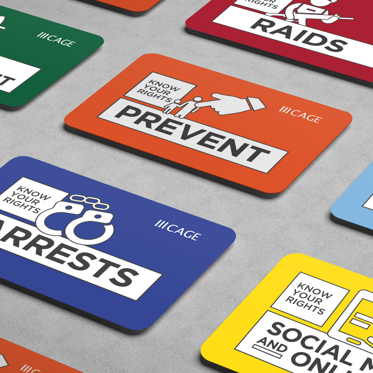 Fold-out legal pocket guides designed for CAGE International, shown as colour-coded Z-card booklets.